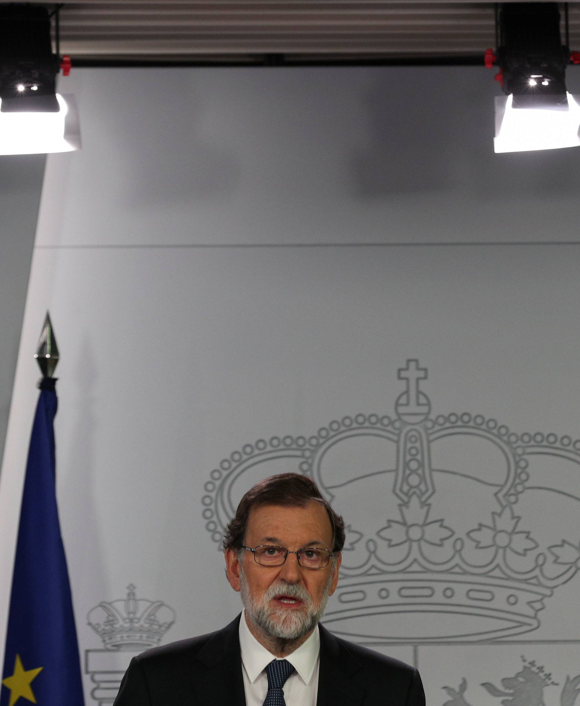 Spain's PM Rajoy delivers a statement at the Moncloa Palace in Madrid