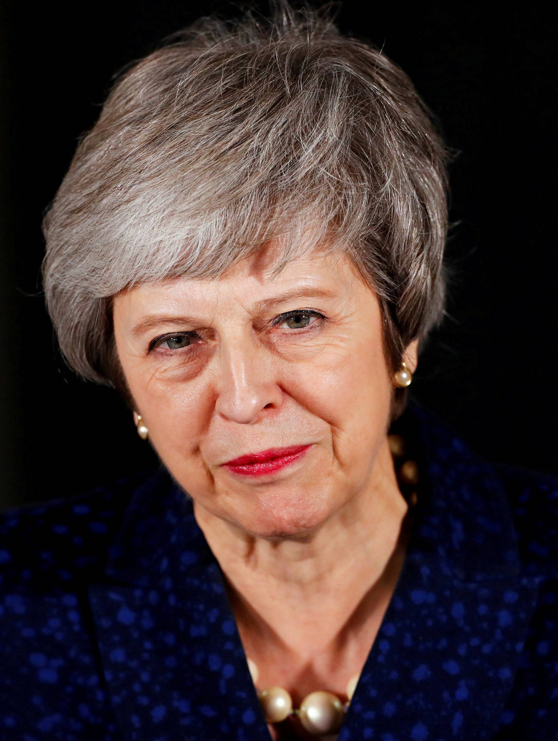 FILE PHOTO: Britain's Prime Minister Theresa May speaks outside 10 Downing Street after a confidence vote by Conservative Party members of parliament, in London