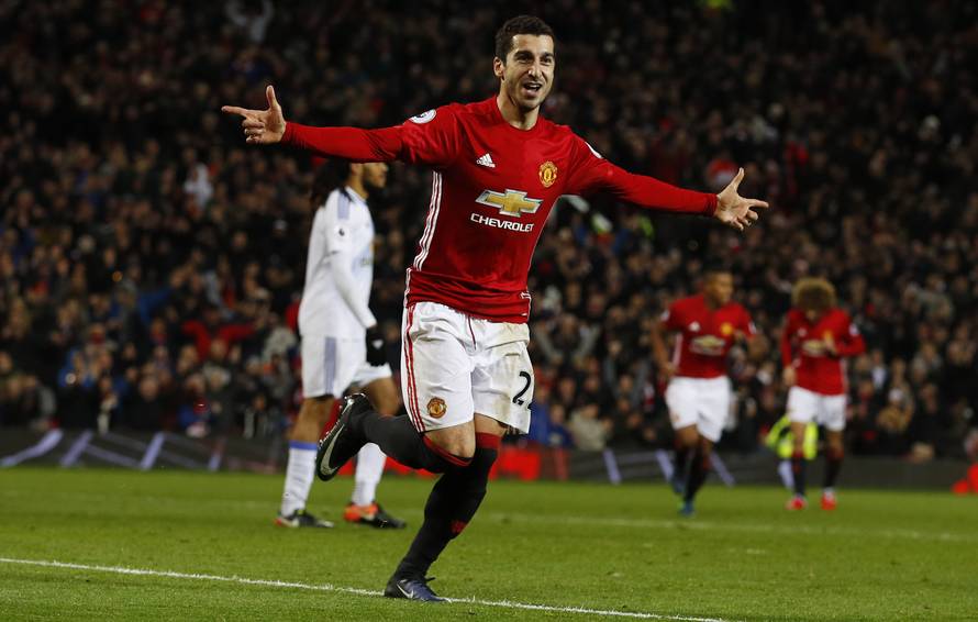 Manchester United's Henrikh Mkhitaryan celebrates scoring their third goal