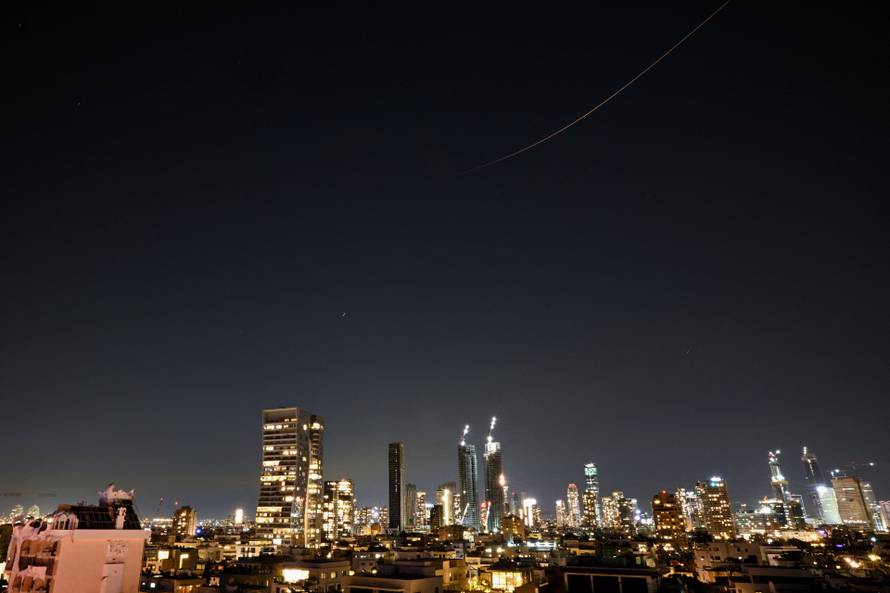 Iranian missile flies towards Israel, as seen from Tel Aviv