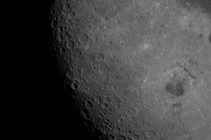 The Moon, with its Orienale basin prominent, is photographed by the Artemis II crew