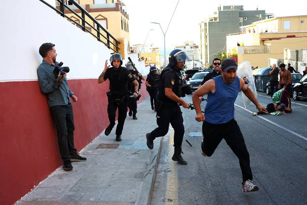 Mass crossings of migrants on foot and by sea from Morocco into Spanish territory, in Ceuta