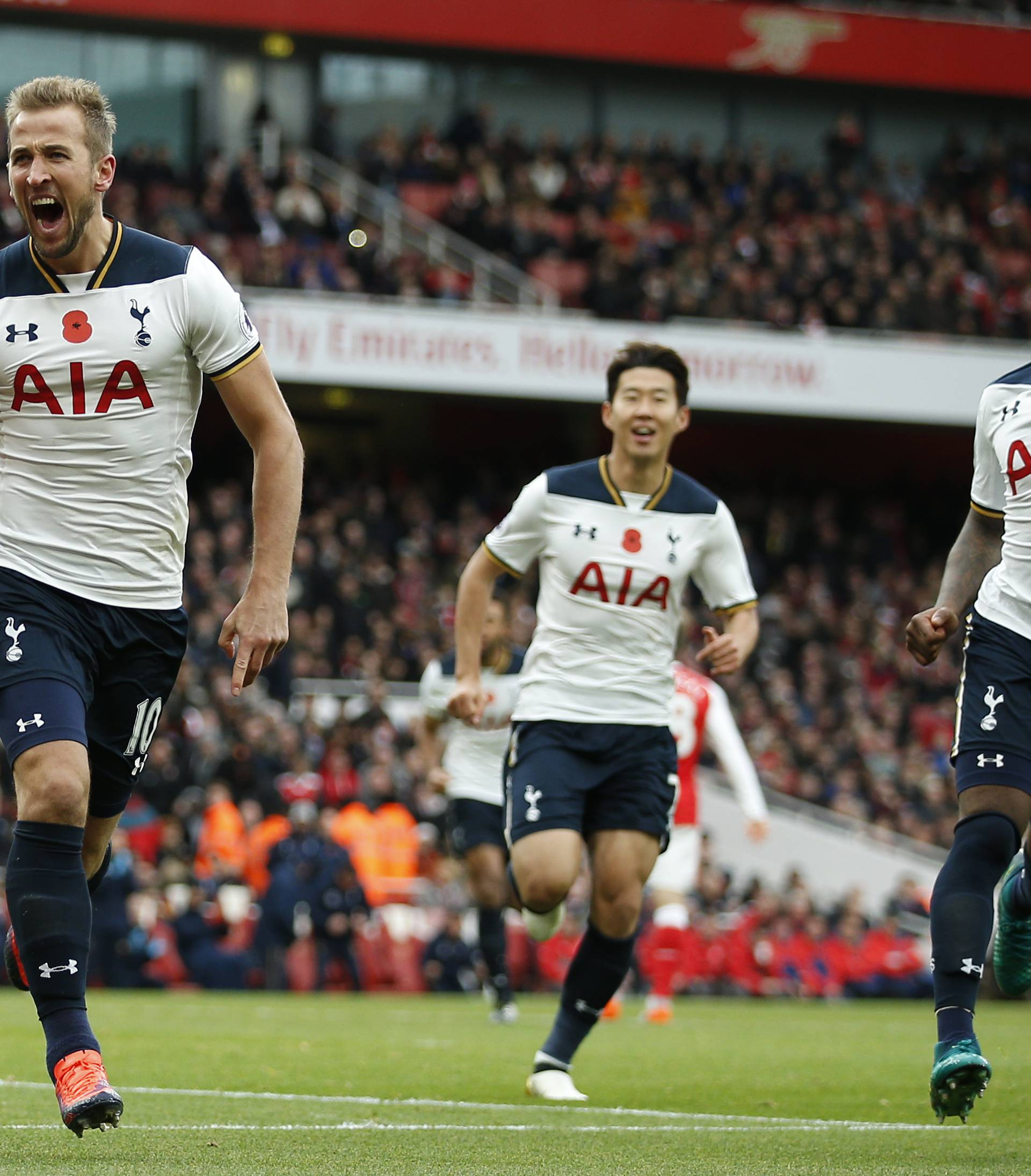 Tottenham's Harry Kane celebrates scoring their first goal from the penalty spot