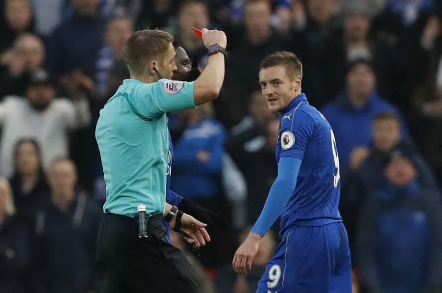 Leicester City's Jamie Vardy is shown a red card by referee Craig Pawson