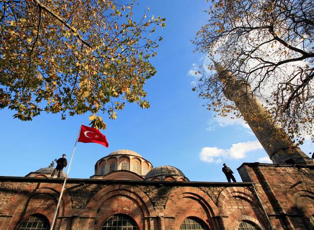FILE PHOTO: Turkish police officers stand guard on the top of the Kariye (Chora) museum in Istanbul