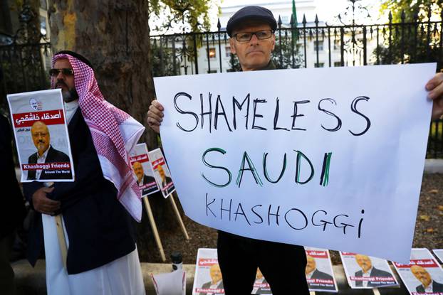 People protest against the killing of journalist Jamal Khashoggi in Turkey outside the Saudi Arabian Embassy in London