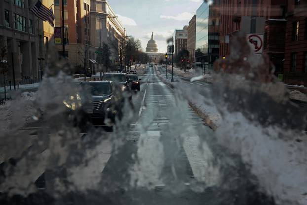 People deal with the aftermath of a major winter storm across a large swath of the United States