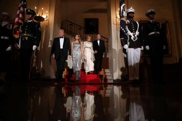 U.S. President Trump, first lady Melania, French President Macron and his wife Brigitte attend a State Dinner at the White House in Washington