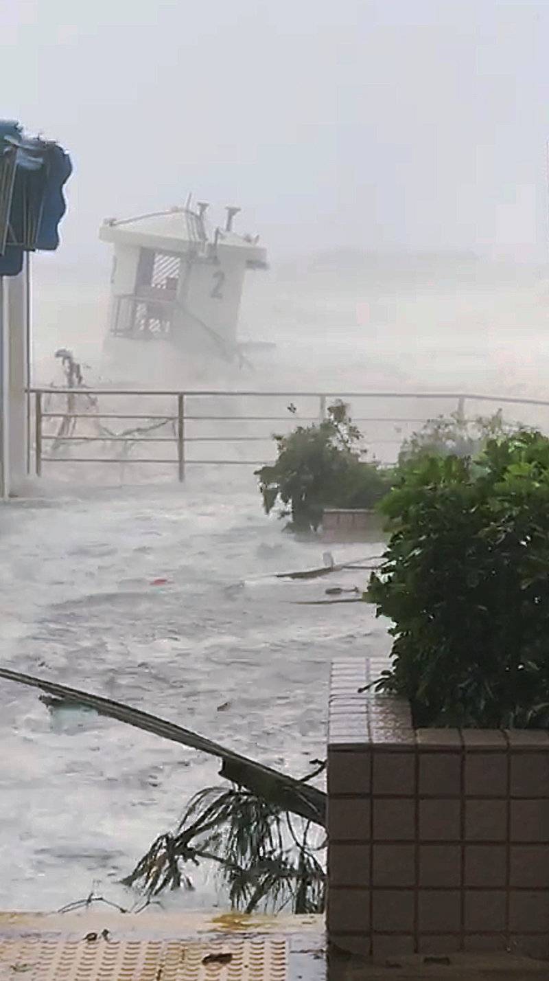 Waves crashes on the beach during Typhoon Mangkhut in Hong Kong