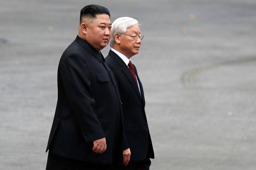 North Korea's leader Kim Jong Un attends a welcoming ceremony at the Presidential Palace in Hanoi