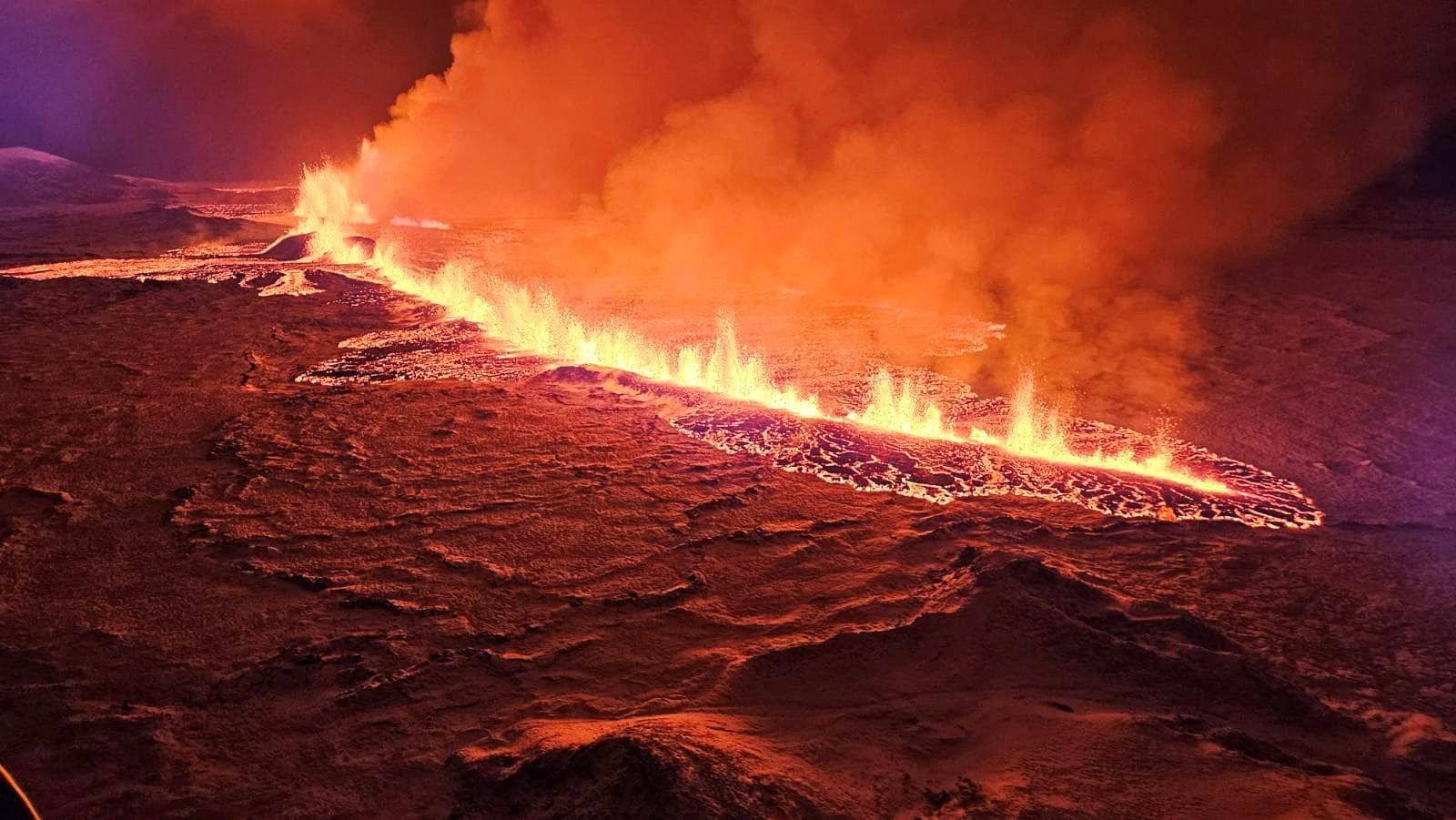 A volcano spews lava and smoke as it erupts in Grindavik