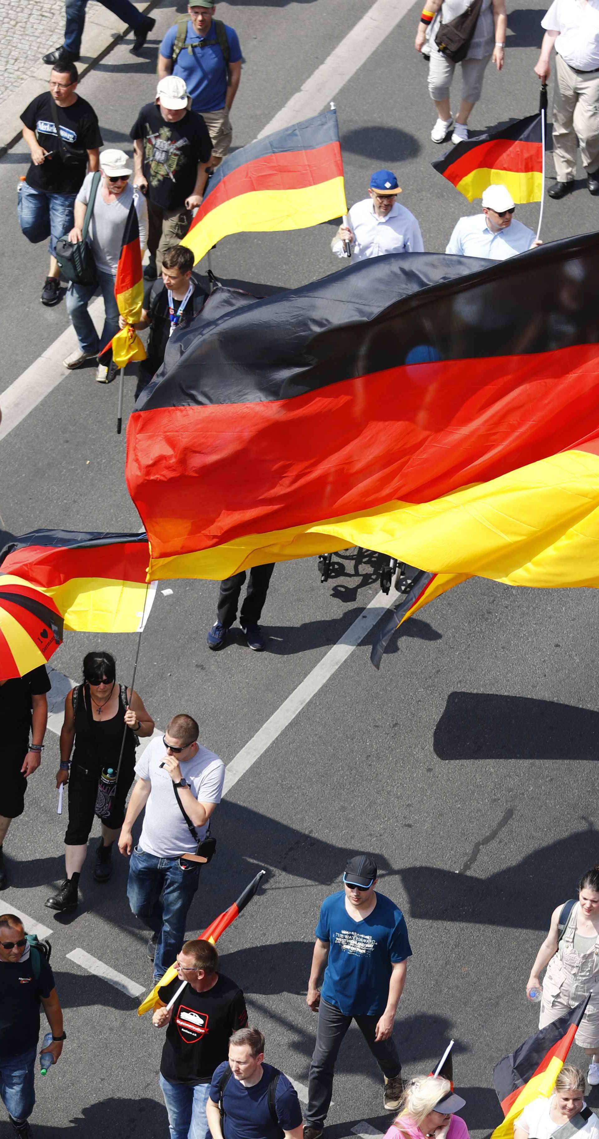 Supporters of the Anti-immigration party Alternative for Germany (AfD) hold a protest in Berlin