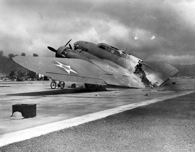 Archive photo of a wrecked U.S. Army Air Corps B-17C bomber at Hickam Air Field in Pearl Harbor