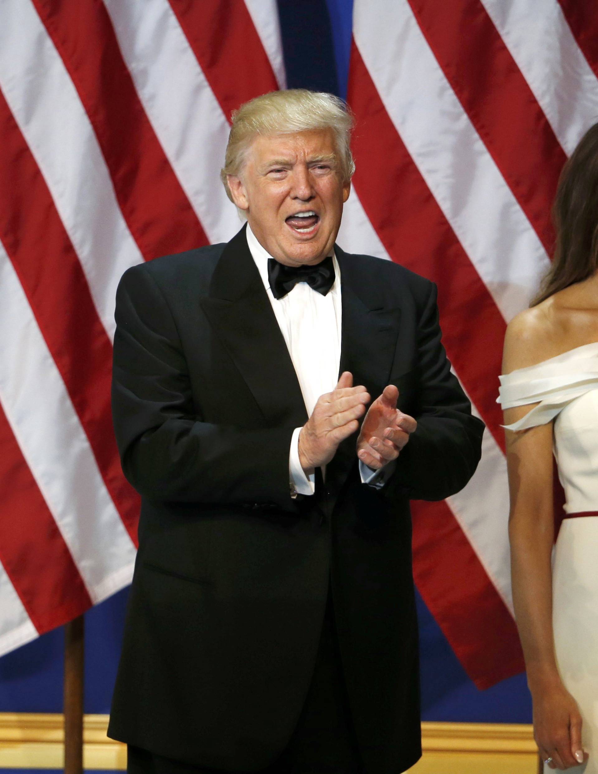 U.S. President Donald Trump and his wife first lady Melania Trump arrive at the "Salute to Our Armed Forces" inaugural ball during inauguration festivites in Washington