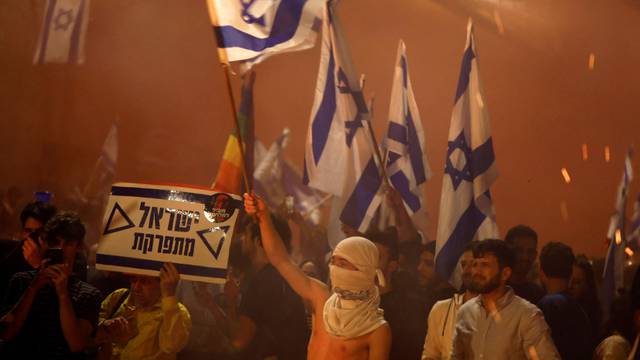 Protests against Israel's judicial overhaul and dismissing the defense minister, in Tel Aviv