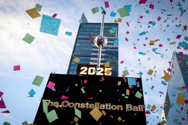 A newly created New Year's eve ball is raised for the first time above One Times Square ahead of the New Year's Eve ball drop in New York