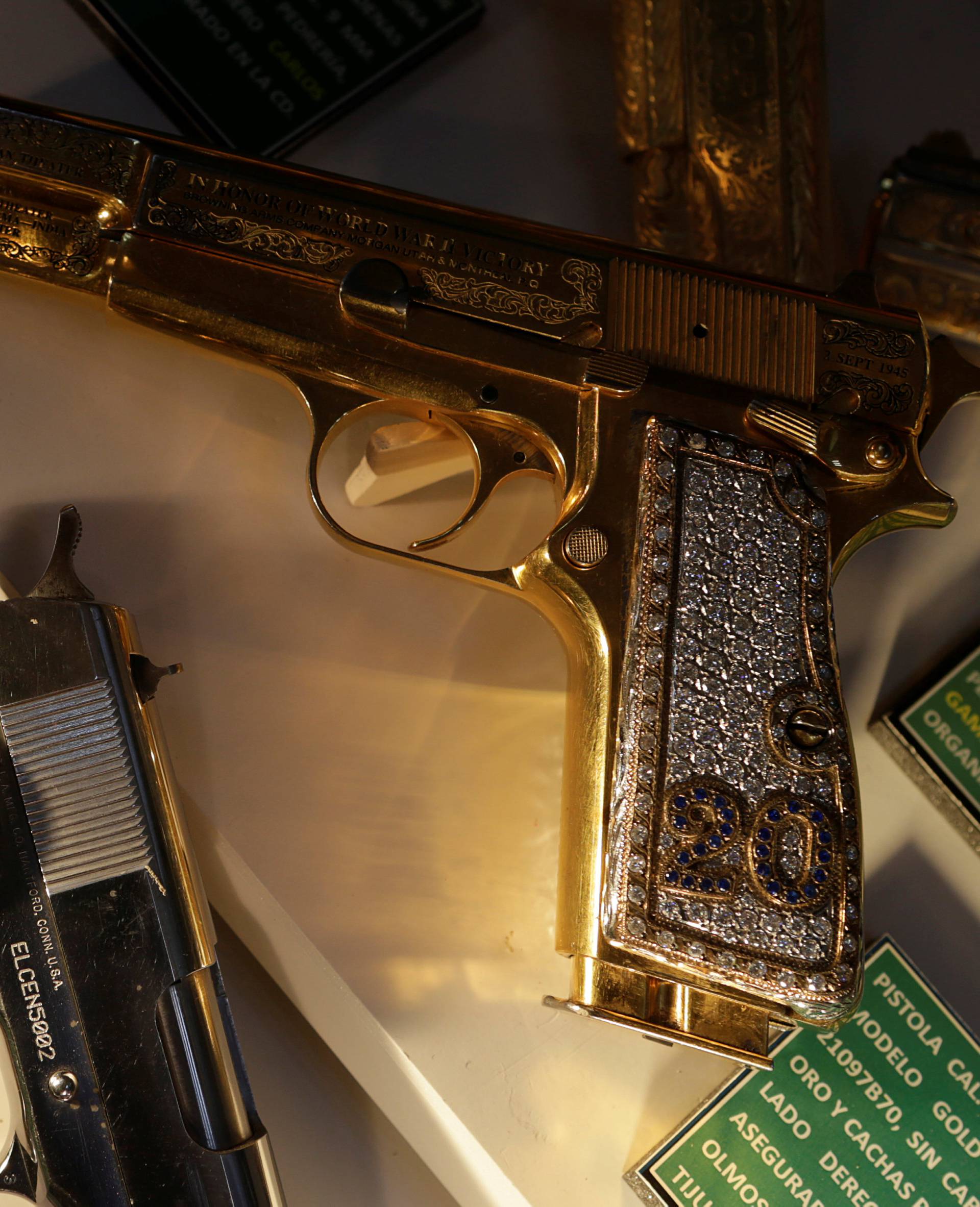 Guns decorated with gold and jewellery are displayed in the Drugs Museum, used by the military to showcase to soldiers the lifestyles of Mexican drug lords, at the headquarters of the Ministry of Defense in Mexico Cit