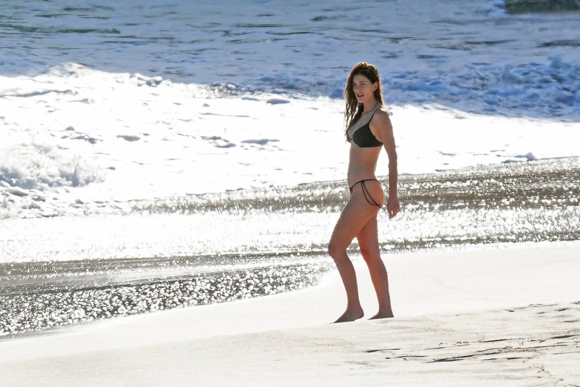 PREMIUM EXCLUSIVE: Leonardo DiCaprio in swim shorts and girlfriend Camila Morrone in a skimpy black bikini enjoy the beach in St Barts