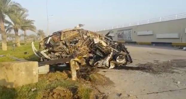 A damaged car, claimed to belong to Qassem Soleimani and Abu Mahdi al Muhandis, is seen near Baghdad International Airport