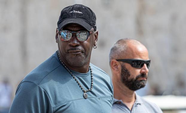 Michael Jordan with his wife Yvette, accompanied by a security guards, walked to Dubrovnik