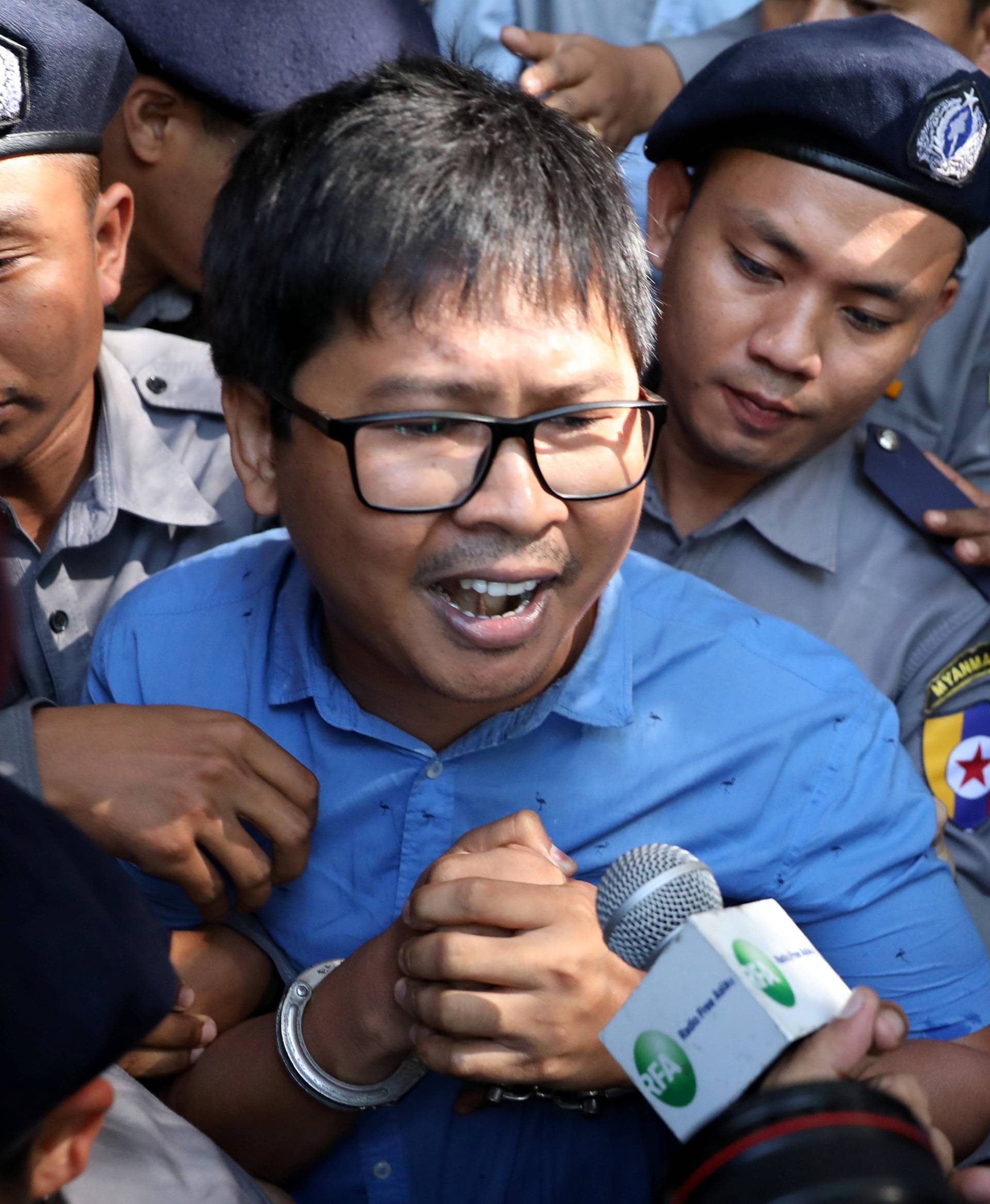 Reuters journalist Wa Lone arrives at the court in Yangon, Myanmar