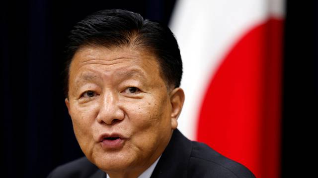 Japan's Economy Minister Yoshitaka Shindo speaks during a group interview in Tokyo