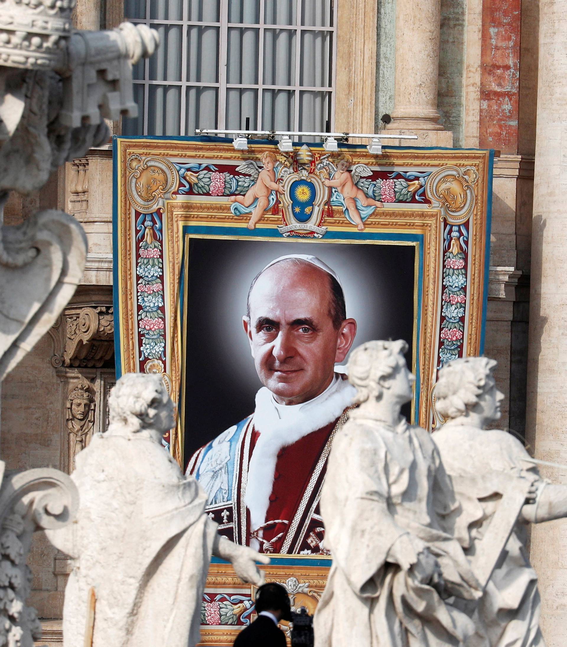 A picture of Pope Paul VI is seen during a Mass for his canonisation at the Vatican