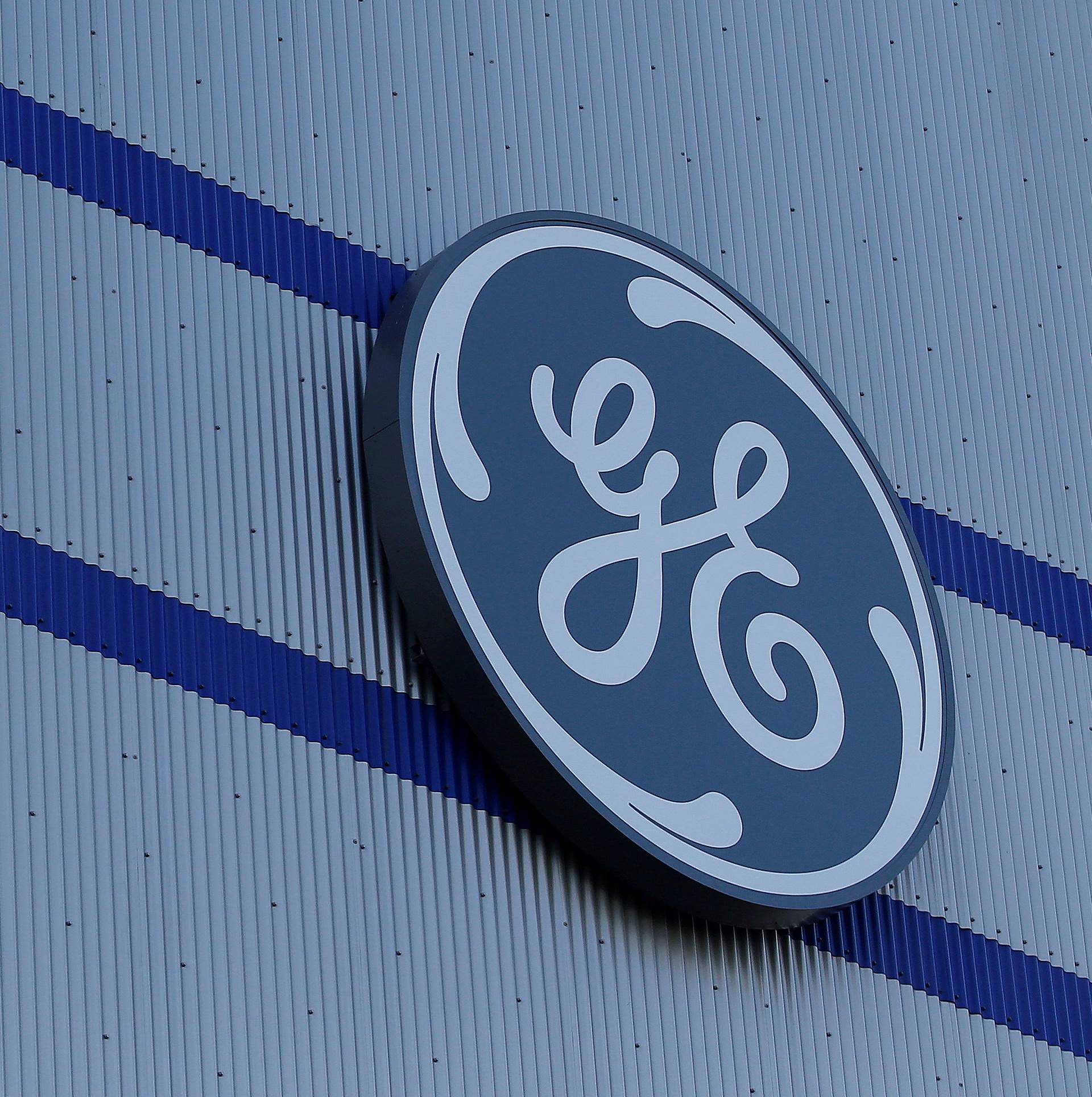 FILE PHOTO: The General Electric logo is pictured on the General Electric offshore wind turbine plant in Montoir-de-Bretagne
