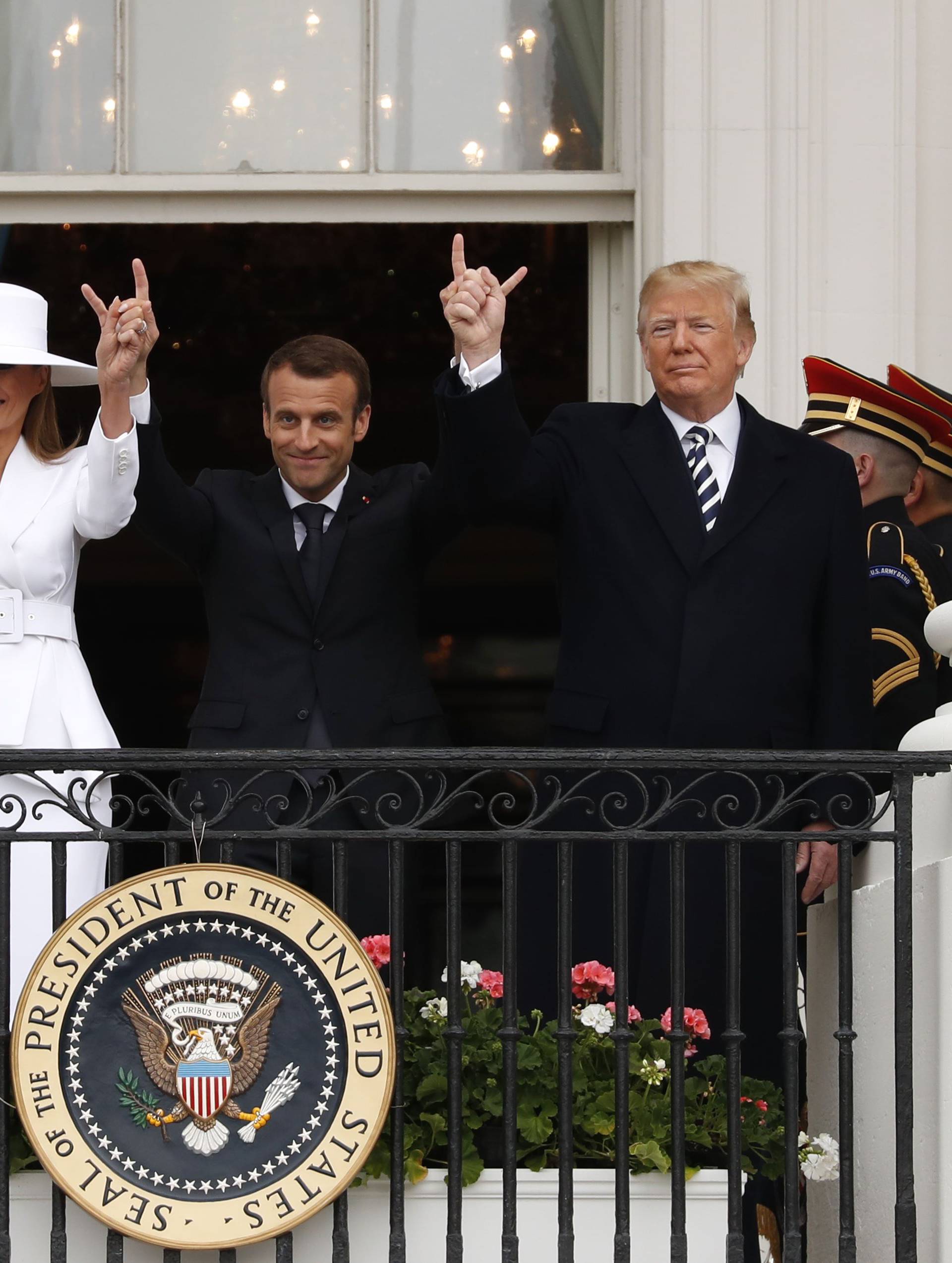 U.S. President Trump welcomes French President Macron during arrival ceremony at the White House in Washington