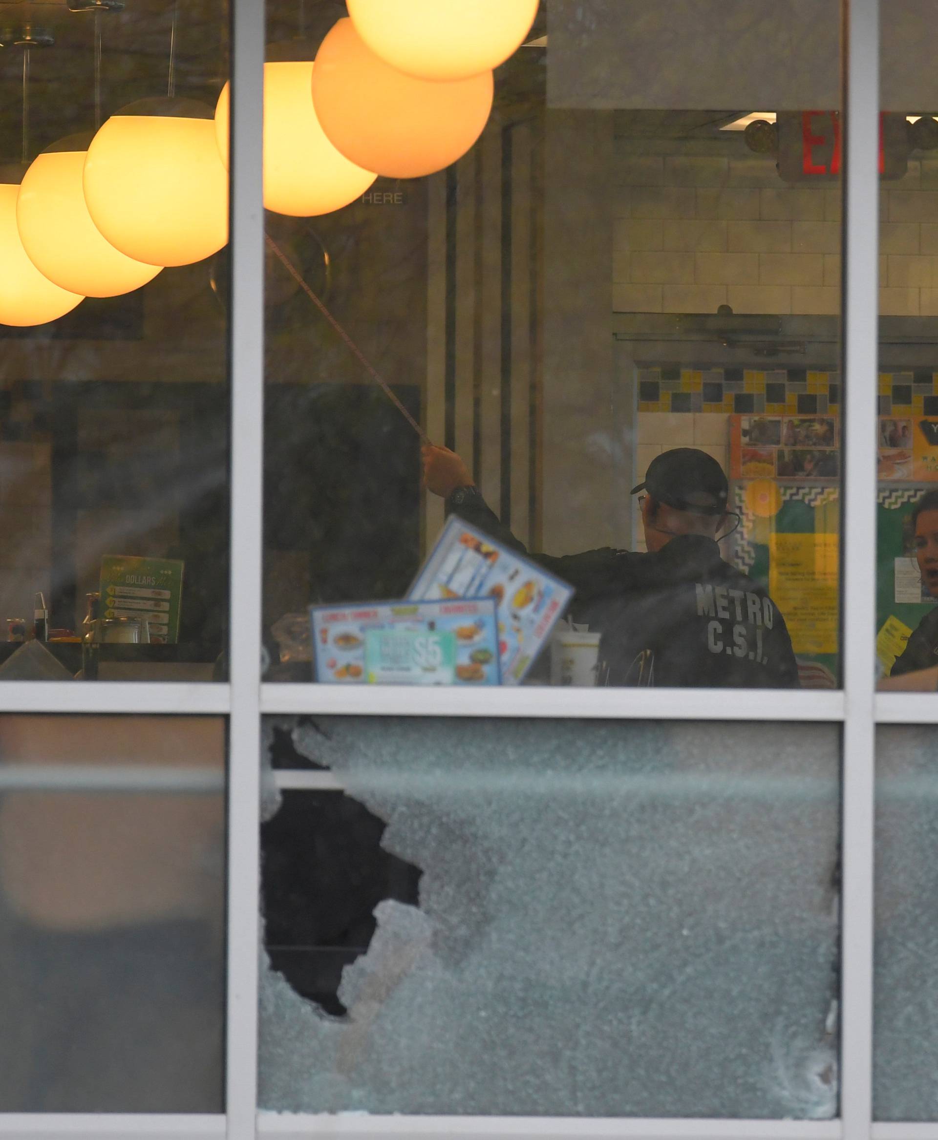 Metro Davidson County Police at the scene of a fatal shooting at a Waffle House restaurant near Nashville, Tennessee