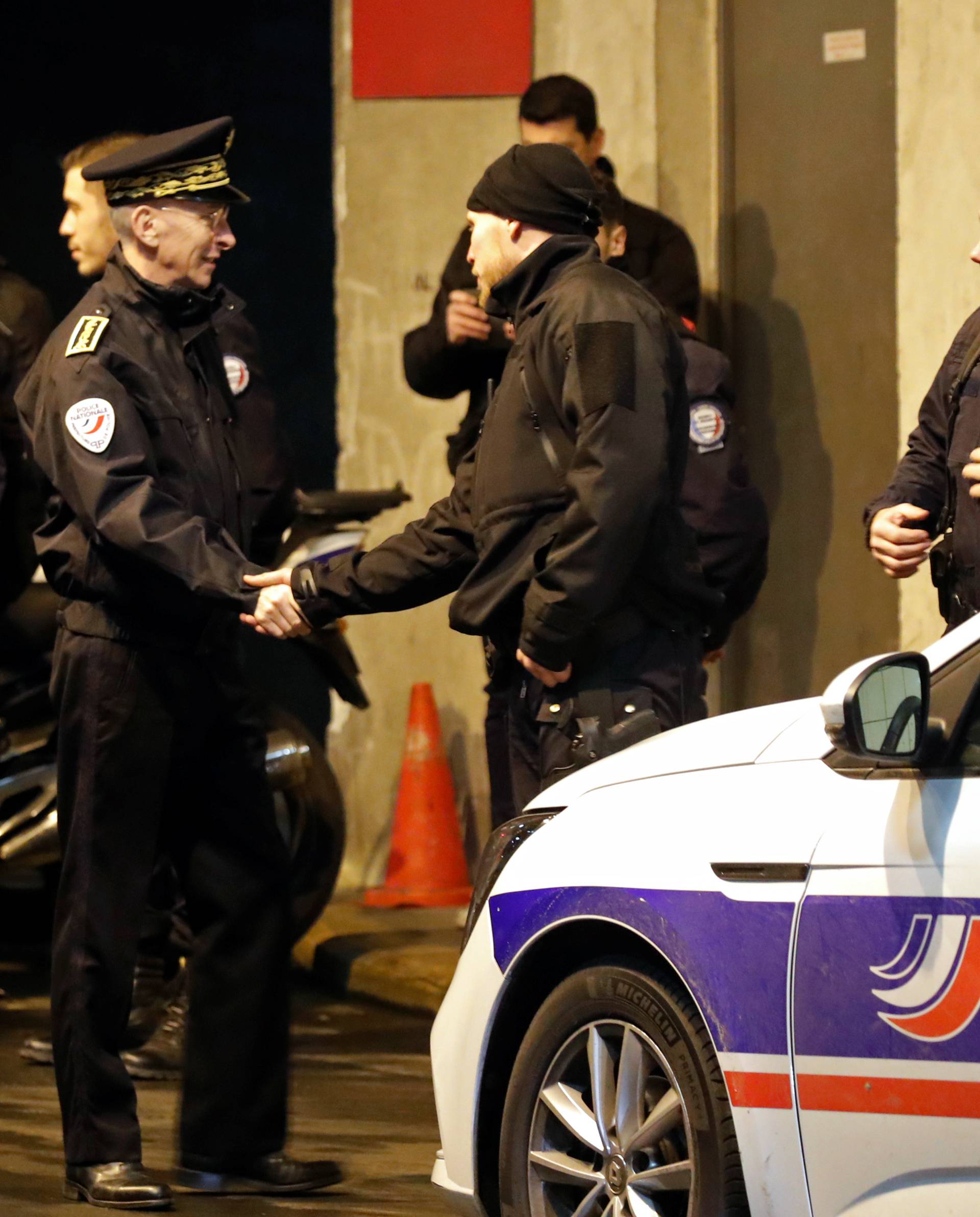 French police secure an area at La Defense business and financial district near Paris