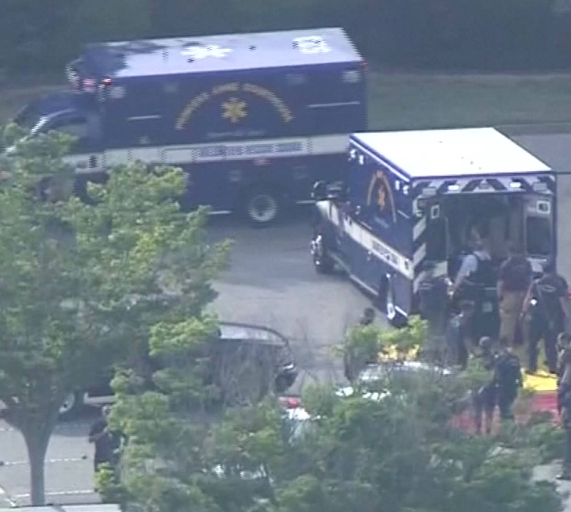 Paramedics prepare a staging area for victims in this still image from video following a shooting incident at the municipal center in Virginia Beach