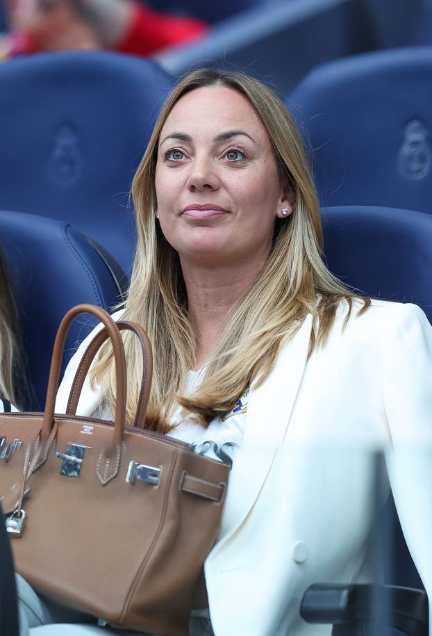 Vanja Modric wore Luke’s jersey and expensive design bag