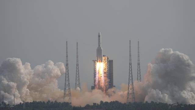 Long March-5B Y4 rocket, carrying the Mengtian lab module for China's under-construction space station Tiangong, takes off from Wenchang Spacecraft Launch Site in Hainan