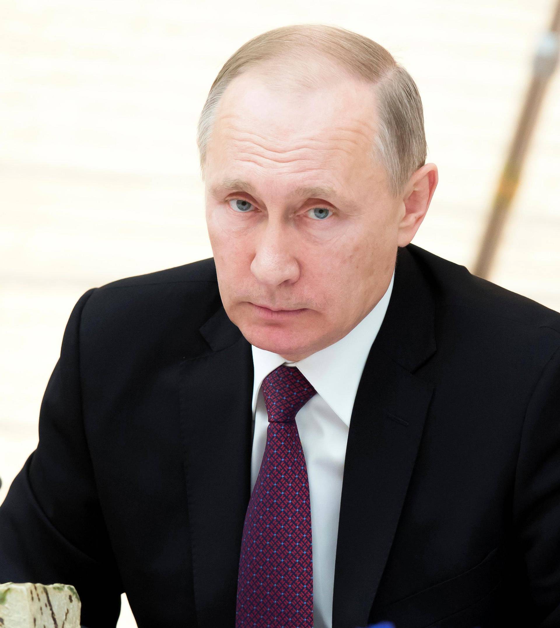 Vladimir Putin, Russia's president, attends a working lunch with Shinzo Abe, Japan's prime minister, not pictured, at the prime minister's official residence in Tokyo, Japan