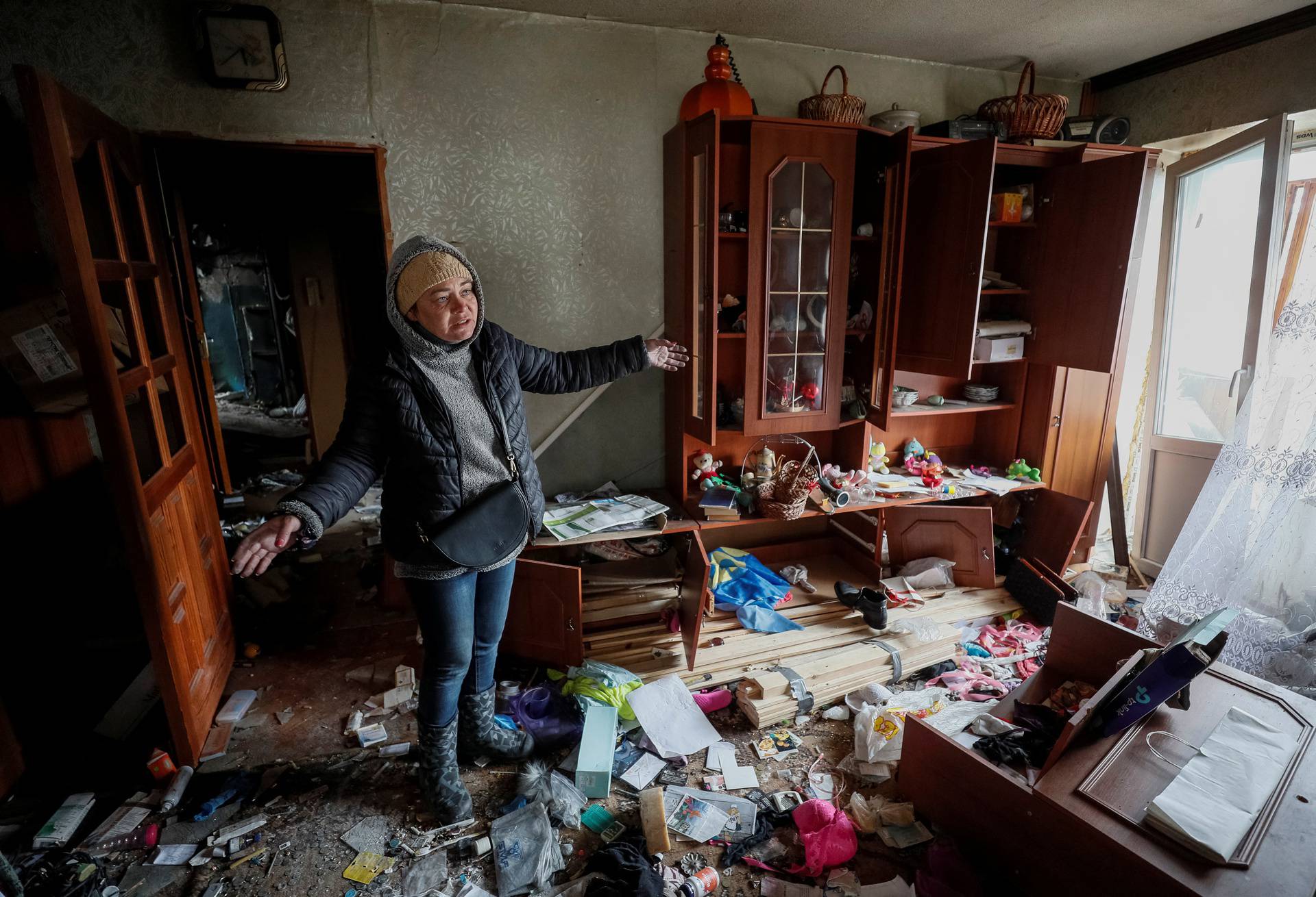 Local resident Olga is seen in her destroyed flat in Borodyanka