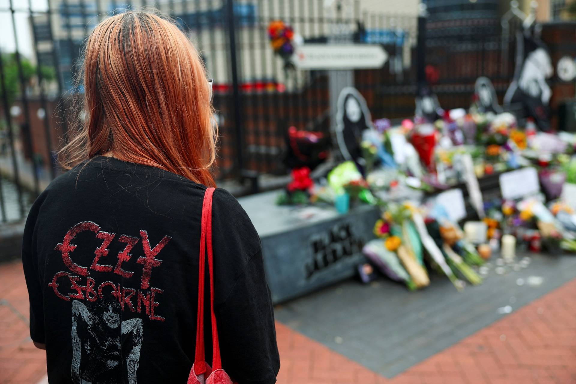 Fans pay tribute following the death of Ozzy Osbourne, in Birmingham