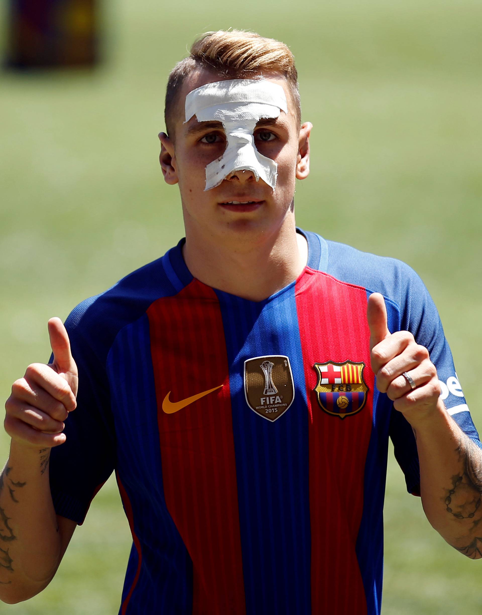 FC Barcelona's newly signed soccer player Lucas Digne poses during his presentation at Camp Nou stadium in Barcelona