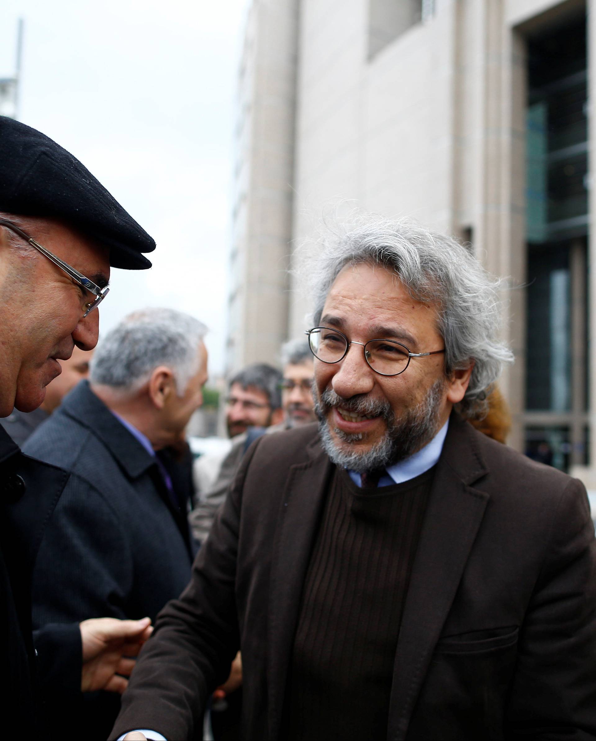 Dundar, editor-in-chief of Cumhuriyet, arrives at the Justice Palace in Istanbul