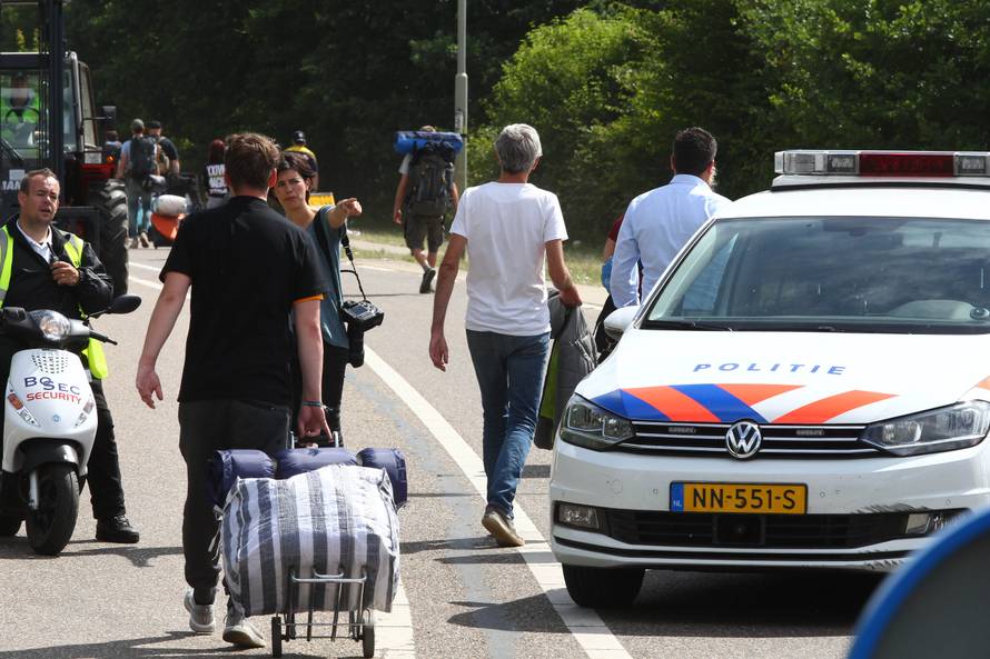 Minibus crashes into group