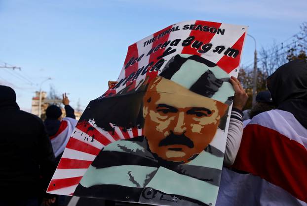 FILE PHOTO: Belarusian opposition supporters hold a rally in Minsk