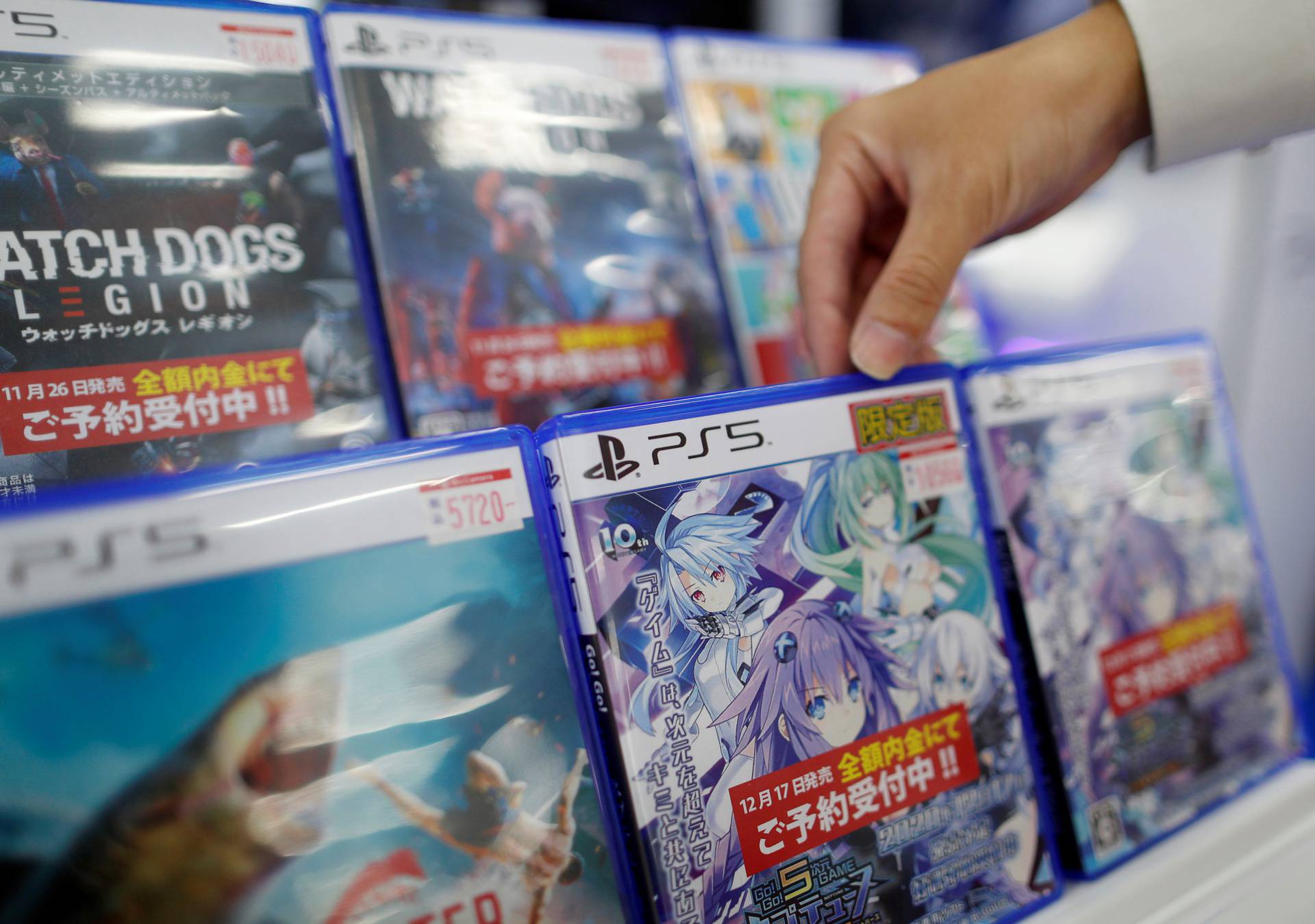 The logos of Sony PlayStation 5 are seen on the package of its' gaming software at the consumer electronics retailer chain Bic Camera in Tokyo