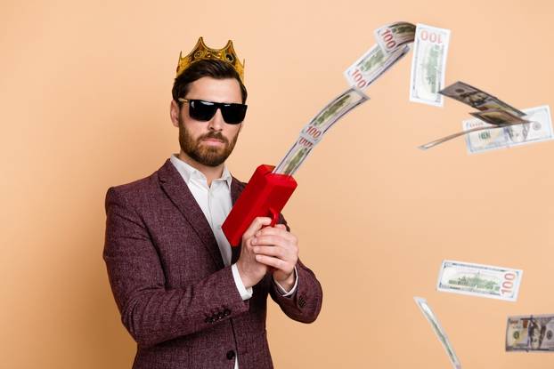 Photo,Of,Young,Wealthy,Businessman,Investor,With,Crown,On,Head
