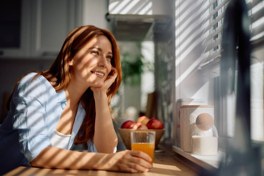 Smiling,Woman,With,Glass,Of,Orange,Juice,Day,Dreaming,In