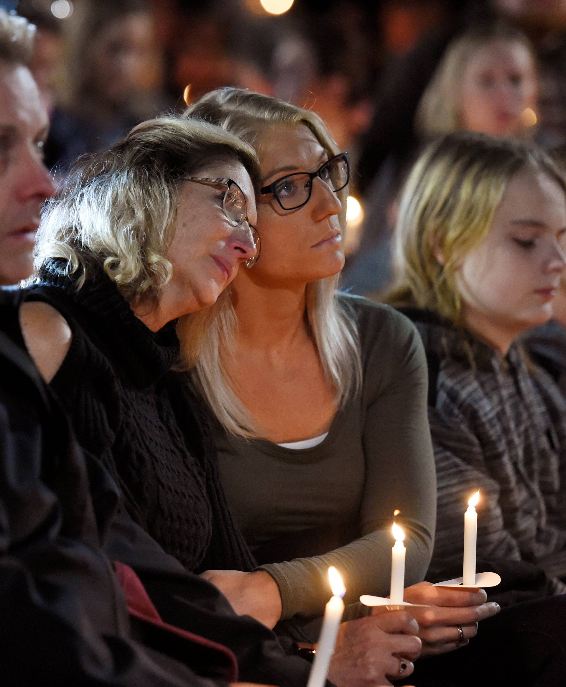 Jill Richardson Perez mother of Matt Coons mourns the loss of her son during a candle-light vigil for the victims of a limousine accident in Amsterdam New York