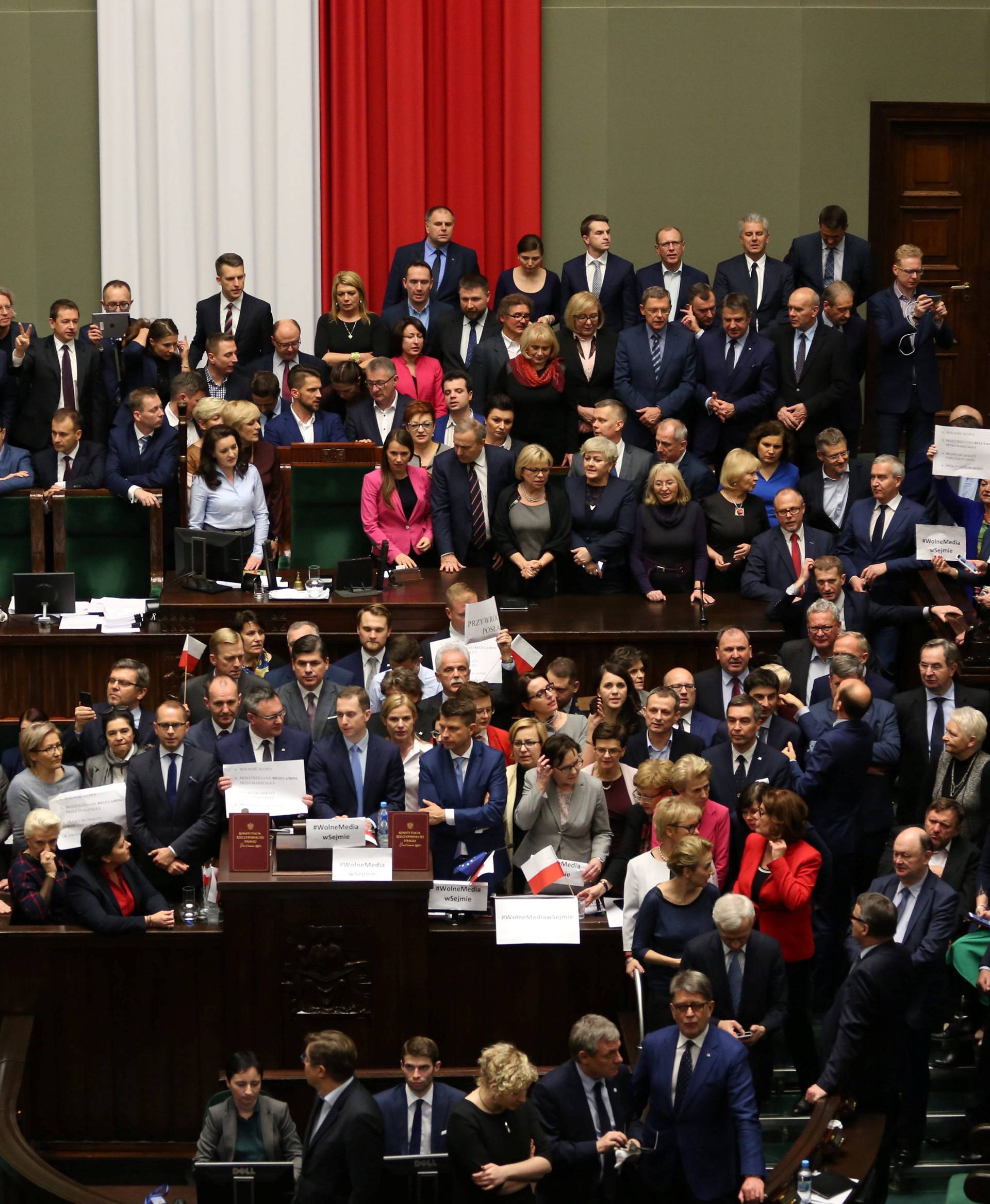 Polish opposition parliamentarians protest against the rules proposed by the head office of the Sejm, the lower house of parliament in the Parliament in Warsaw