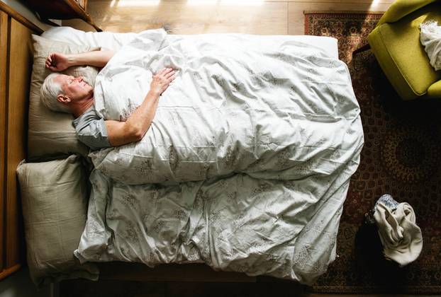 Elderly,Caucasian,Man,Sleeping,On,The,Bed