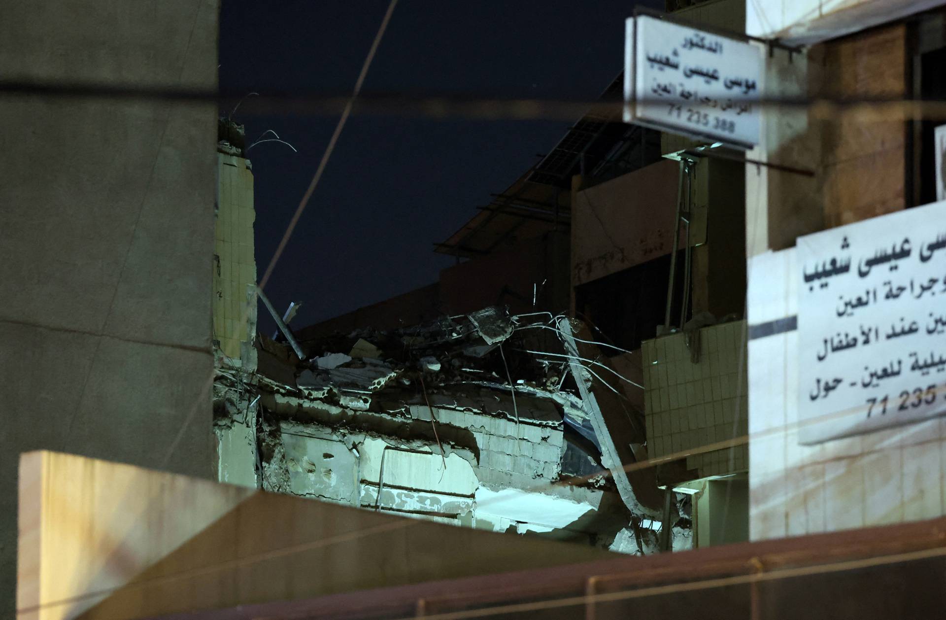 A view shows damage after what security sources said was a strike on Beirut's southern suburbs