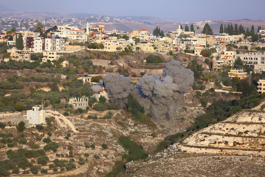 Smoke rises after Israeli strikes following Israeli military's evacuation orders, in Chehour