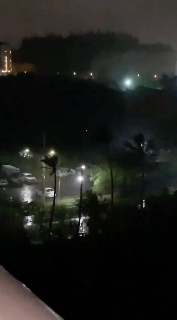 Heavy rain and strong wind brought by super typhoon Hagibis are seen over the U.S. territory of Guam